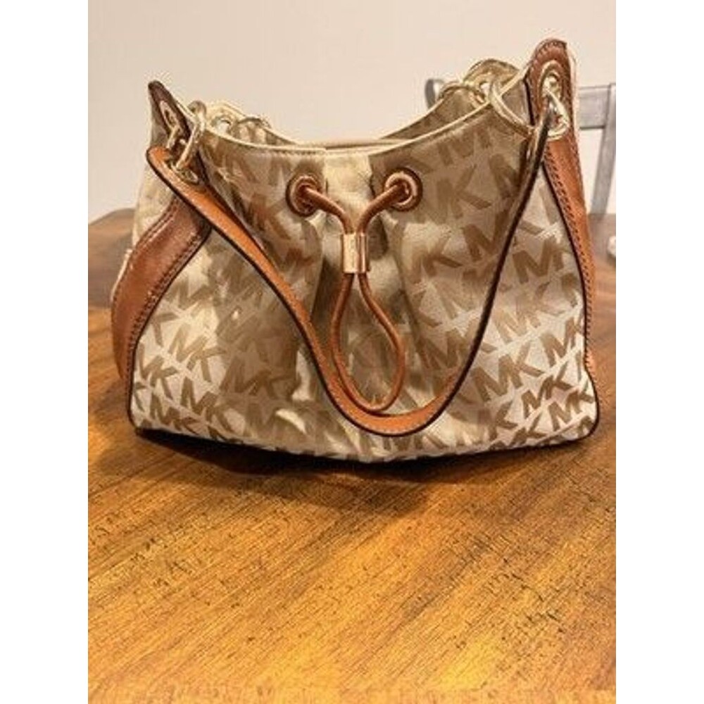 Michael Kors MK Monogram Jacquard Drawstring Shoulder Bag Tan Brown Leather